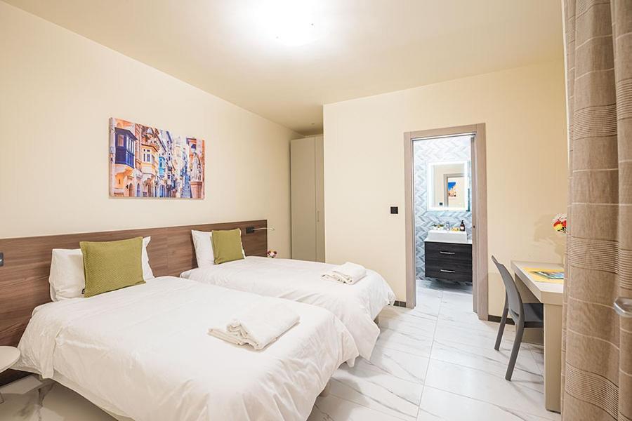 Atlantis Holiday Suites Marsalforn Bagian luar foto